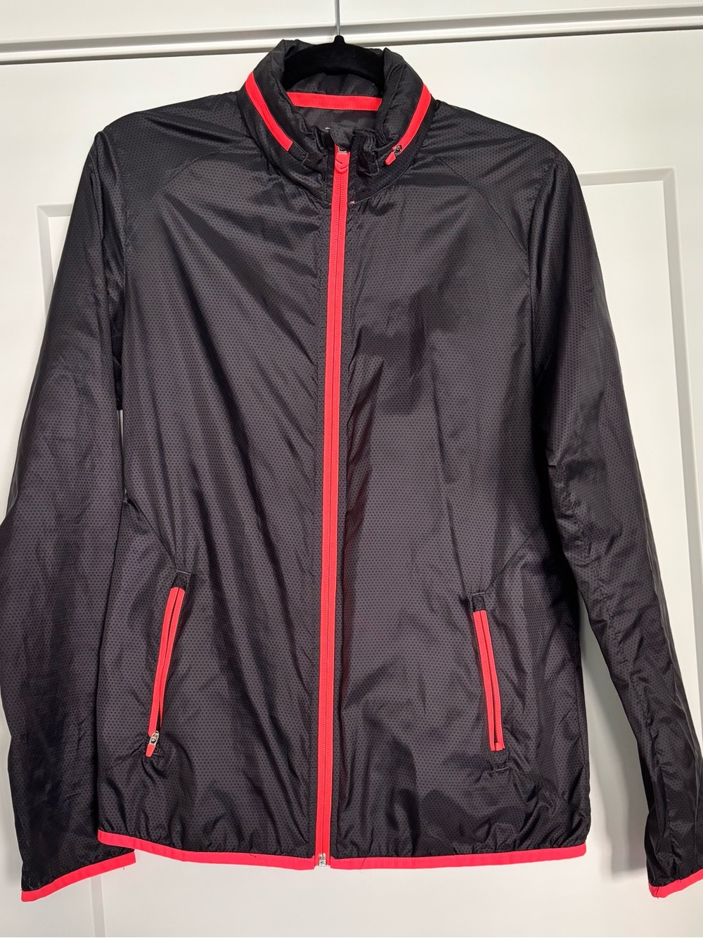 Women’s Golf Windbreaker with Packable Hood and Pink Trim